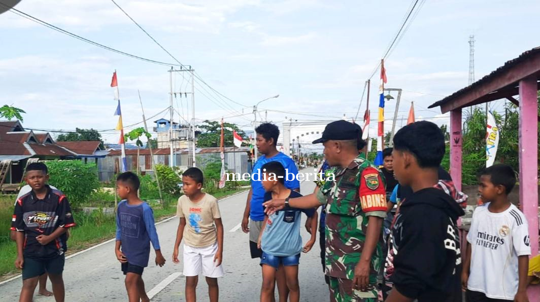 Meriahkan HUT RI, Babinsa Muara Tami Bersama Warga Koya Barat Gelar Perlombaan