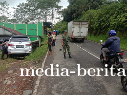 Babinsa Bersama Bhabinkamtibmas Atur Lalu Lintas