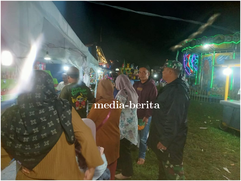 Babinsa Koramil 19 Bumijawa Laksanakan Monitoring Serta Pengamanan Kegiatan Bazar UMKM Di Desa Binaa